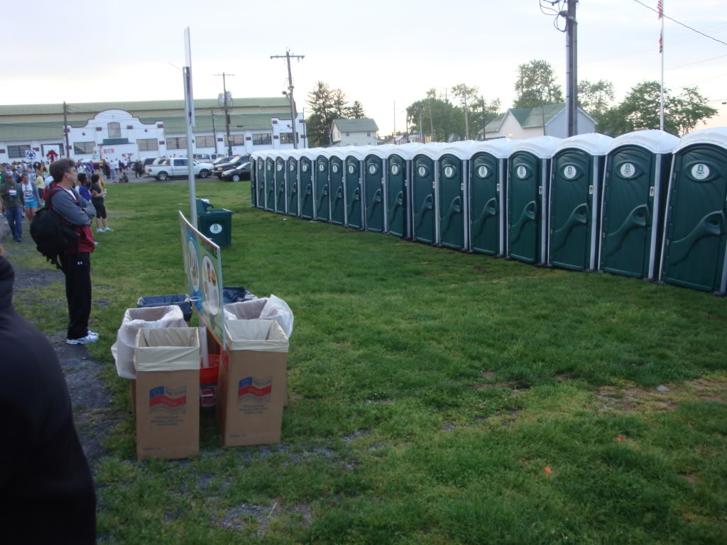 One man line at porta-potties