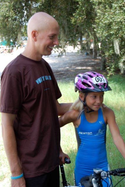 Michael supporting his daughter, Winter