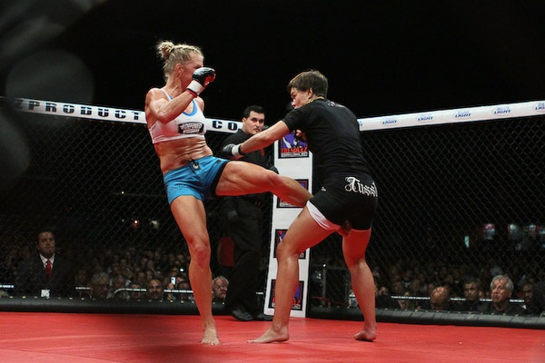 Holly Holm (white top) vs. Jan Finney